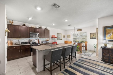 Stunning 4-bedroom, 2-bath split floor plan home in gated Lake on Lake Diamond Golf and Country Club in Florida - for sale on GolfHomes.com, golf home, golf lot