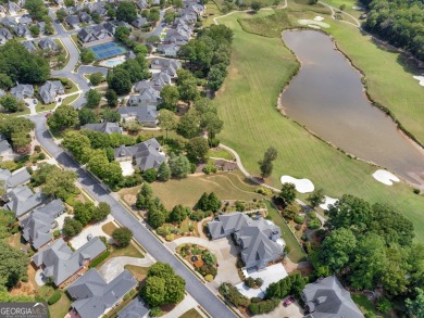 This exquisite family home is the epitome of luxury living on Eagles Landing Country Club in Georgia - for sale on GolfHomes.com, golf home, golf lot