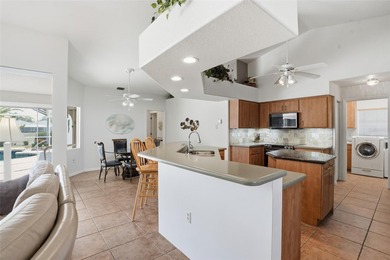 Welcome to this TURNKEY 3 bedroom, 2 bathroom, 2-car garage pool on Deep Creek Golf Club in Florida - for sale on GolfHomes.com, golf home, golf lot