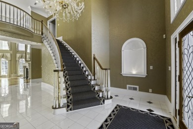 This exquisite family home is the epitome of luxury living on Eagles Landing Country Club in Georgia - for sale on GolfHomes.com, golf home, golf lot