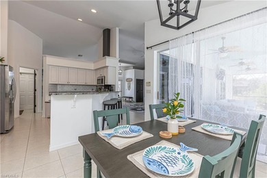 One of the BEST PRICED golf course pool homes in Royal Palm Golf on Eagle Lakes Golf Club in Florida - for sale on GolfHomes.com, golf home, golf lot