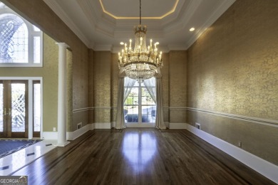 This exquisite family home is the epitome of luxury living on Eagles Landing Country Club in Georgia - for sale on GolfHomes.com, golf home, golf lot