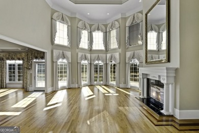 This exquisite family home is the epitome of luxury living on Eagles Landing Country Club in Georgia - for sale on GolfHomes.com, golf home, golf lot