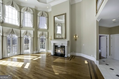 This exquisite family home is the epitome of luxury living on Eagles Landing Country Club in Georgia - for sale on GolfHomes.com, golf home, golf lot