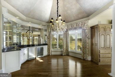 This exquisite family home is the epitome of luxury living on Eagles Landing Country Club in Georgia - for sale on GolfHomes.com, golf home, golf lot