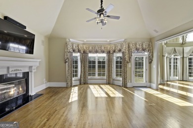 This exquisite family home is the epitome of luxury living on Eagles Landing Country Club in Georgia - for sale on GolfHomes.com, golf home, golf lot