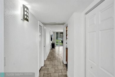 Beautiful lake view 2BR/2BA condo in Pine Island Ridge! Spacious on Pine Island Ridge Country Club in Florida - for sale on GolfHomes.com, golf home, golf lot
