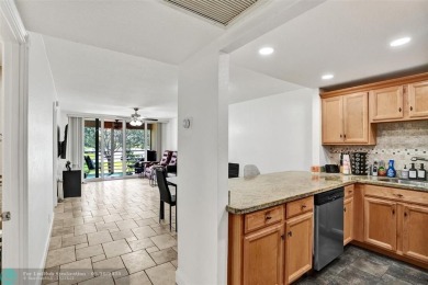 Beautiful lake view 2BR/2BA condo in Pine Island Ridge! Spacious on Pine Island Ridge Country Club in Florida - for sale on GolfHomes.com, golf home, golf lot