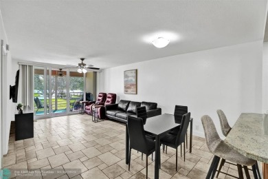 Beautiful lake view 2BR/2BA condo in Pine Island Ridge! Spacious on Pine Island Ridge Country Club in Florida - for sale on GolfHomes.com, golf home, golf lot