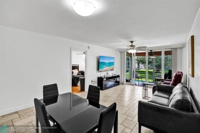 Beautiful lake view 2BR/2BA condo in Pine Island Ridge! Spacious on Pine Island Ridge Country Club in Florida - for sale on GolfHomes.com, golf home, golf lot