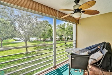 Beautiful lake view 2BR/2BA condo in Pine Island Ridge! Spacious on Pine Island Ridge Country Club in Florida - for sale on GolfHomes.com, golf home, golf lot