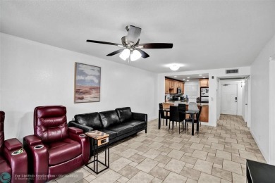 Beautiful lake view 2BR/2BA condo in Pine Island Ridge! Spacious on Pine Island Ridge Country Club in Florida - for sale on GolfHomes.com, golf home, golf lot