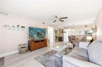 Beautiful move in ready FIRST FLOOR condo with a prime lake view on Bonita Fairways in Florida - for sale on GolfHomes.com, golf home, golf lot