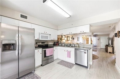 Beautiful move in ready FIRST FLOOR condo with a prime lake view on Bonita Fairways in Florida - for sale on GolfHomes.com, golf home, golf lot