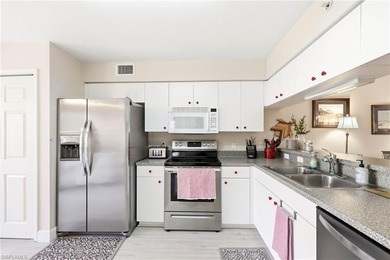 Beautiful move in ready FIRST FLOOR condo with a prime lake view on Bonita Fairways in Florida - for sale on GolfHomes.com, golf home, golf lot