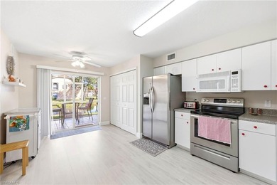 Beautiful move in ready FIRST FLOOR condo with a prime lake view on Bonita Fairways in Florida - for sale on GolfHomes.com, golf home, golf lot