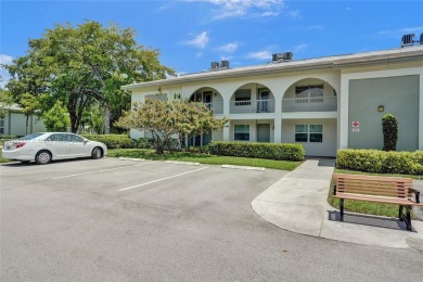 Welcome to this beautifully updated 2 bed, 2 bath first-floor on Wynmoor Golf Course in Florida - for sale on GolfHomes.com, golf home, golf lot