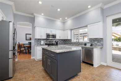 Located in a quiet neighborhood in the popular East Lake on East Lake Woodlands Country Club in Florida - for sale on GolfHomes.com, golf home, golf lot