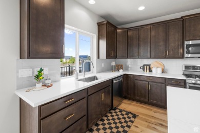 Location is everything! This beautiful 2-story home sits on a on Stansbury Park Golf Club in Utah - for sale on GolfHomes.com, golf home, golf lot