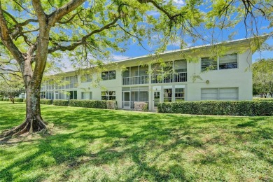 Welcome to this beautifully updated 2 bed, 2 bath first-floor on Wynmoor Golf Course in Florida - for sale on GolfHomes.com, golf home, golf lot