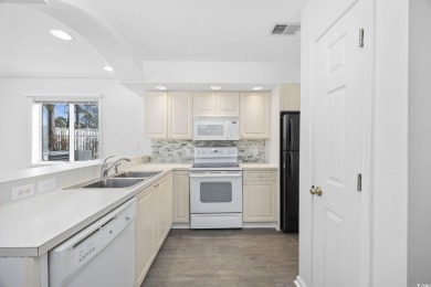Welcome to this beautiful first-floor, end-unit condo in on The Valley At Eastport in South Carolina - for sale on GolfHomes.com, golf home, golf lot