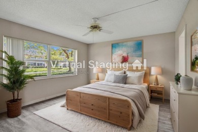 Welcome to this beautifully updated 2 bed, 2 bath first-floor on Wynmoor Golf Course in Florida - for sale on GolfHomes.com, golf home, golf lot