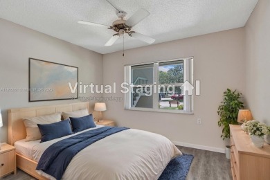 Welcome to this beautifully updated 2 bed, 2 bath first-floor on Wynmoor Golf Course in Florida - for sale on GolfHomes.com, golf home, golf lot