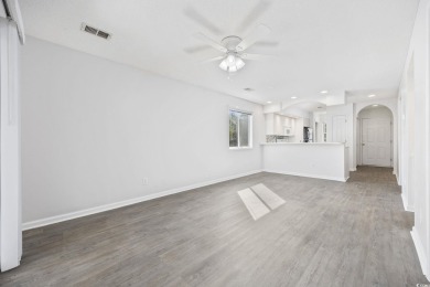 Welcome to this beautiful first-floor, end-unit condo in on The Valley At Eastport in South Carolina - for sale on GolfHomes.com, golf home, golf lot