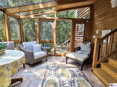 Welcome back to this exceptional Lindal Cedar Home, masterfully on Doe Valley Country Club in Kentucky - for sale on GolfHomes.com, golf home, golf lot