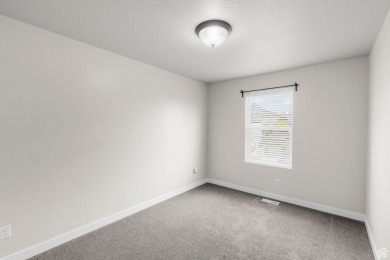 Location is everything! This beautiful 2-story home sits on a on Stansbury Park Golf Club in Utah - for sale on GolfHomes.com, golf home, golf lot