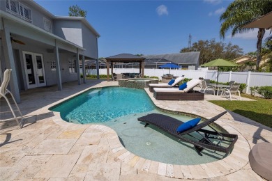 Located in a quiet neighborhood in the popular East Lake on East Lake Woodlands Country Club in Florida - for sale on GolfHomes.com, golf home, golf lot