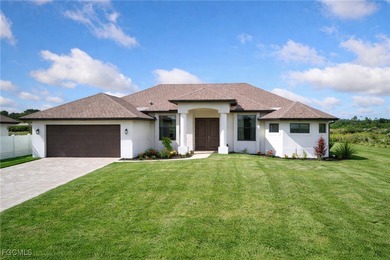 A 2022-built pool home on a true double lot with a wide-open on Burnt Store Golf Club in Florida - for sale on GolfHomes.com, golf home, golf lot