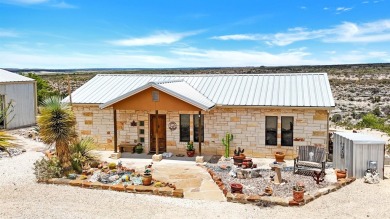 Welcome to 202 Bluebonnet Drive; your perfect Lake Home Retreat! on San Felipe Country Club in Texas - for sale on GolfHomes.com, golf home, golf lot