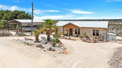 Welcome to 202 Bluebonnet Drive; your perfect Lake Home Retreat! on San Felipe Country Club in Texas - for sale on GolfHomes.com, golf home, golf lot