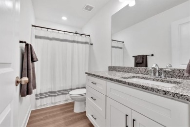 Discover the charm of this nearly new 2023 craftsman-style home on The Highlands Course at Lake Arrowhead in Georgia - for sale on GolfHomes.com, golf home, golf lot