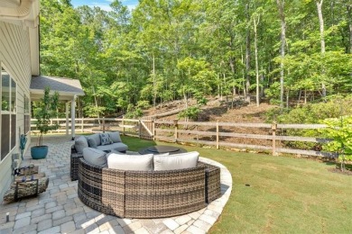 Discover the charm of this nearly new 2023 craftsman-style home on The Highlands Course at Lake Arrowhead in Georgia - for sale on GolfHomes.com, golf home, golf lot