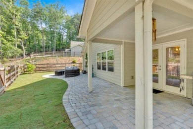 Discover the charm of this nearly new 2023 craftsman-style home on The Highlands Course at Lake Arrowhead in Georgia - for sale on GolfHomes.com, golf home, golf lot
