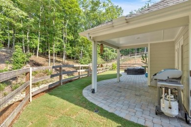 Discover the charm of this nearly new 2023 craftsman-style home on The Highlands Course at Lake Arrowhead in Georgia - for sale on GolfHomes.com, golf home, golf lot
