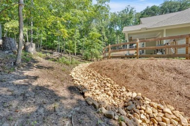 Discover the charm of this nearly new 2023 craftsman-style home on The Highlands Course at Lake Arrowhead in Georgia - for sale on GolfHomes.com, golf home, golf lot