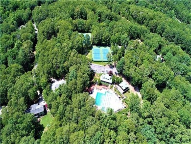 Discover the charm of this nearly new 2023 craftsman-style home on The Highlands Course at Lake Arrowhead in Georgia - for sale on GolfHomes.com, golf home, golf lot