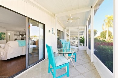 This polished home has updates throughout, a screened-in lanai on Riviera Golf Club in Florida - for sale on GolfHomes.com, golf home, golf lot