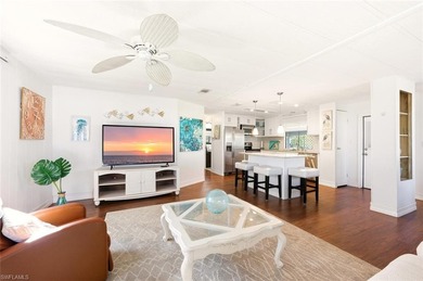 This polished home has updates throughout, a screened-in lanai on Riviera Golf Club in Florida - for sale on GolfHomes.com, golf home, golf lot