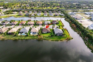 Buyer's Agents Welcome! This 1/3 Acre Waterfront Estate Home on Palm Beach Gardens Golf Course in Florida - for sale on GolfHomes.com, golf home, golf lot