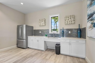 Buyer's Agents Welcome! This 1/3 Acre Waterfront Estate Home on Palm Beach Gardens Golf Course in Florida - for sale on GolfHomes.com, golf home, golf lot