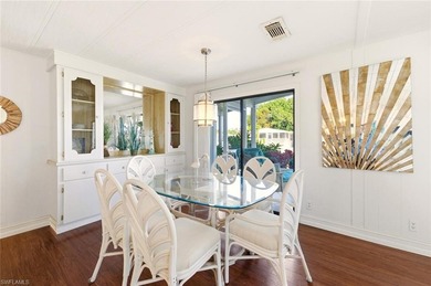 This polished home has updates throughout, a screened-in lanai on Riviera Golf Club in Florida - for sale on GolfHomes.com, golf home, golf lot