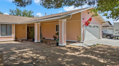 Welcome to this delightful 3-bedroom, 2-bathroom home, boasting on Tierra Del Sol Golf Course in California - for sale on GolfHomes.com, golf home, golf lot