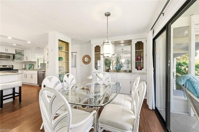 This polished home has updates throughout, a screened-in lanai on Riviera Golf Club in Florida - for sale on GolfHomes.com, golf home, golf lot