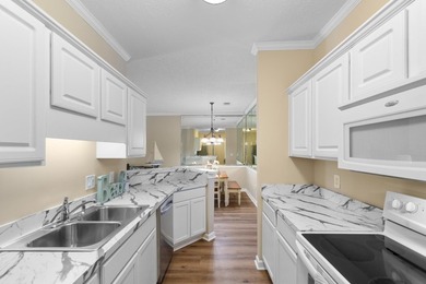 Wake up each morning to peaceful views of the lake and the golf on Arrowhead Country Club in South Carolina - for sale on GolfHomes.com, golf home, golf lot