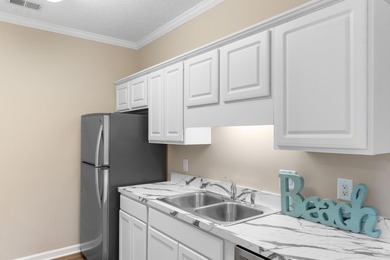 Wake up each morning to peaceful views of the lake and the golf on Arrowhead Country Club in South Carolina - for sale on GolfHomes.com, golf home, golf lot