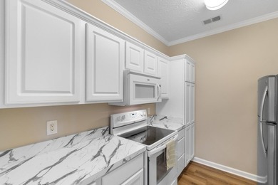 Wake up each morning to peaceful views of the lake and the golf on Arrowhead Country Club in South Carolina - for sale on GolfHomes.com, golf home, golf lot